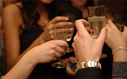 Glasses clinking together